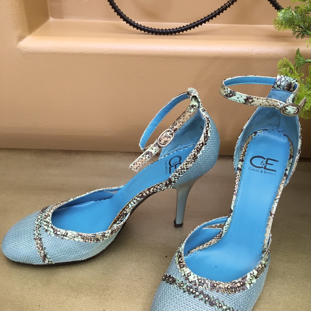 Toe in/heel in open foot sandals in gorgeous light teal blue with detail.